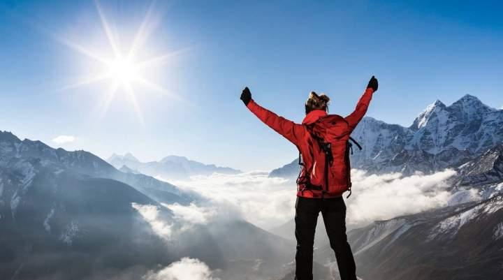 A man on top of a mountain 